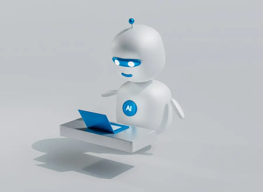 Un petit robot blanc travaille sur un ordinateur portable